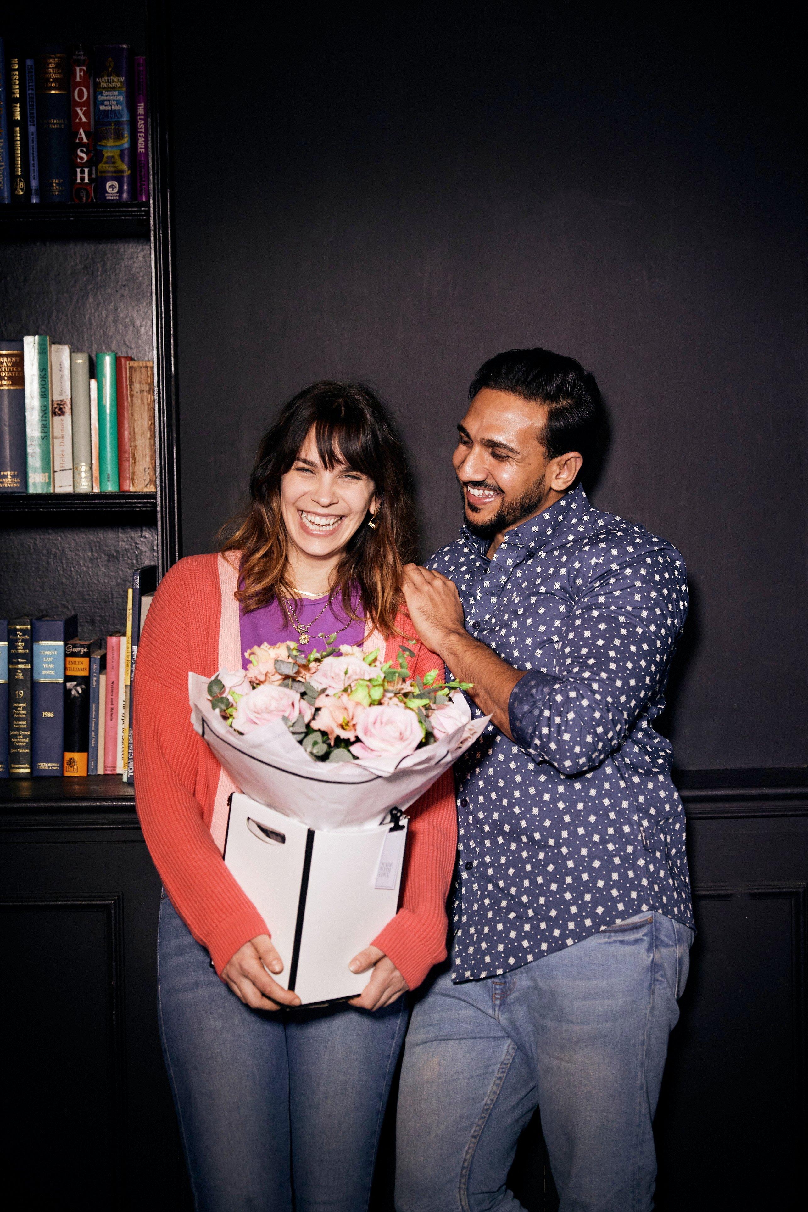 Couple with large bouquet