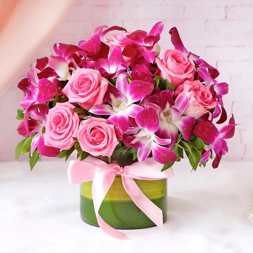 Image 1 of 1 of Purple Orchids & Pink Roses In Round Vase