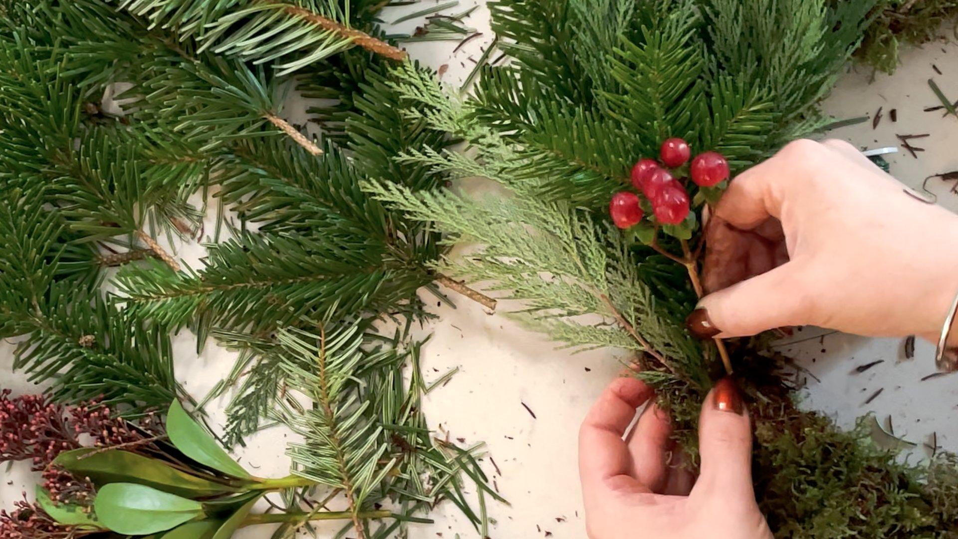 adding_hypericum_to_wreath