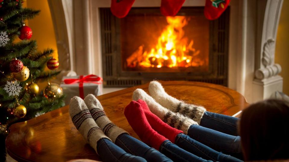 family-fluffy-socks-by-fire