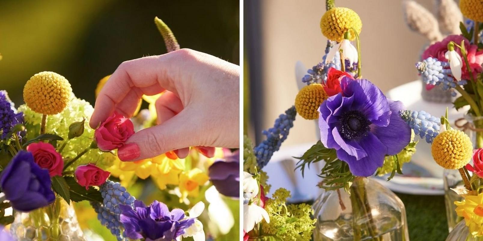 hand-touching-spring-flowers