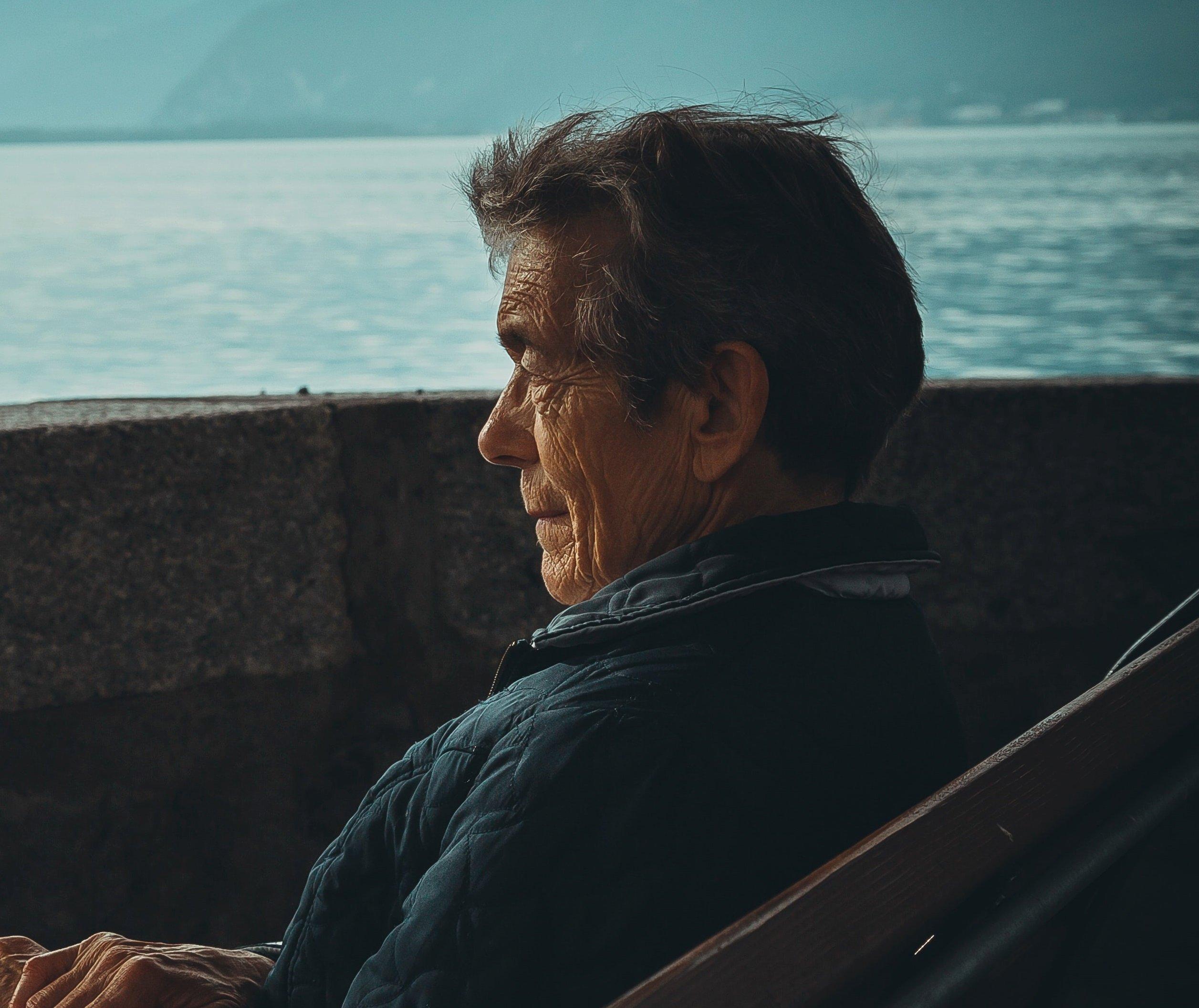 old-man-by-lake-sympathy-page