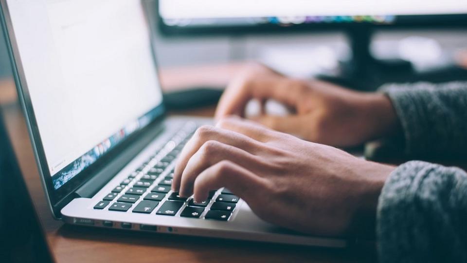 typing-on-computer-stock-image